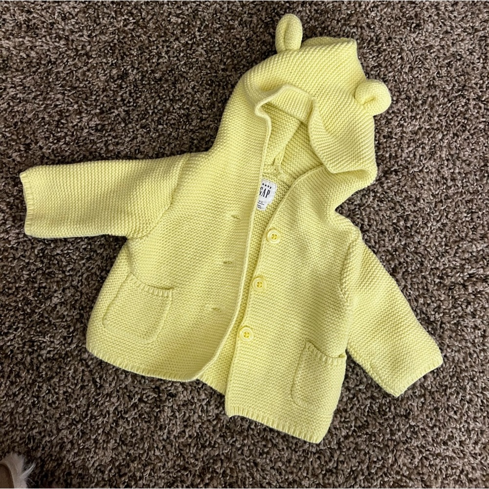 Bright yellow cardigan sweater